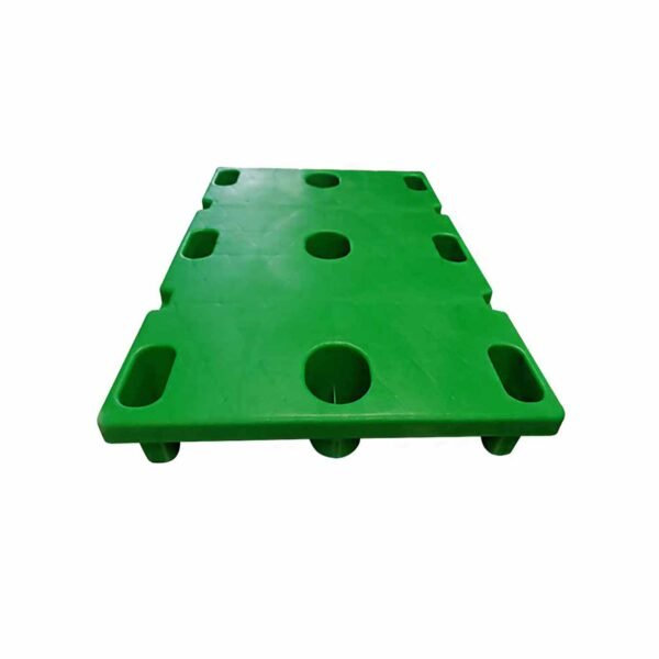 A green Printing Nestable 9 Legs Plastic Pallet, featuring multiple holes and a flat top, suitable for efficient storage and transport in the printing sector.