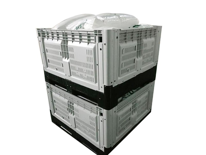 Folding pallet box, strong load capacity, ideal for shipping.