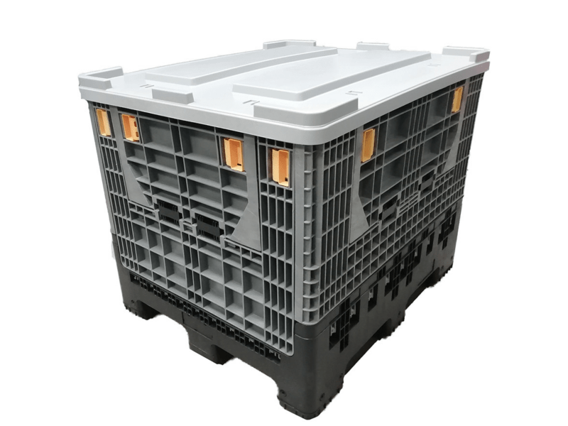 A gray collapsible pallet box with a grid - like structure, a flat top, and orange accents, designed for easy storage and transport.