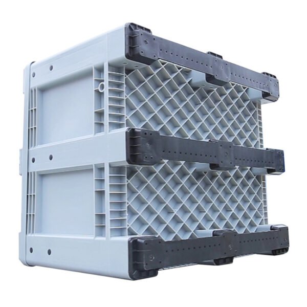 A rigid plastic pallet box, shown from a side angle, emphasizing its robust structure with reinforced sections, ideal for industrial applications.