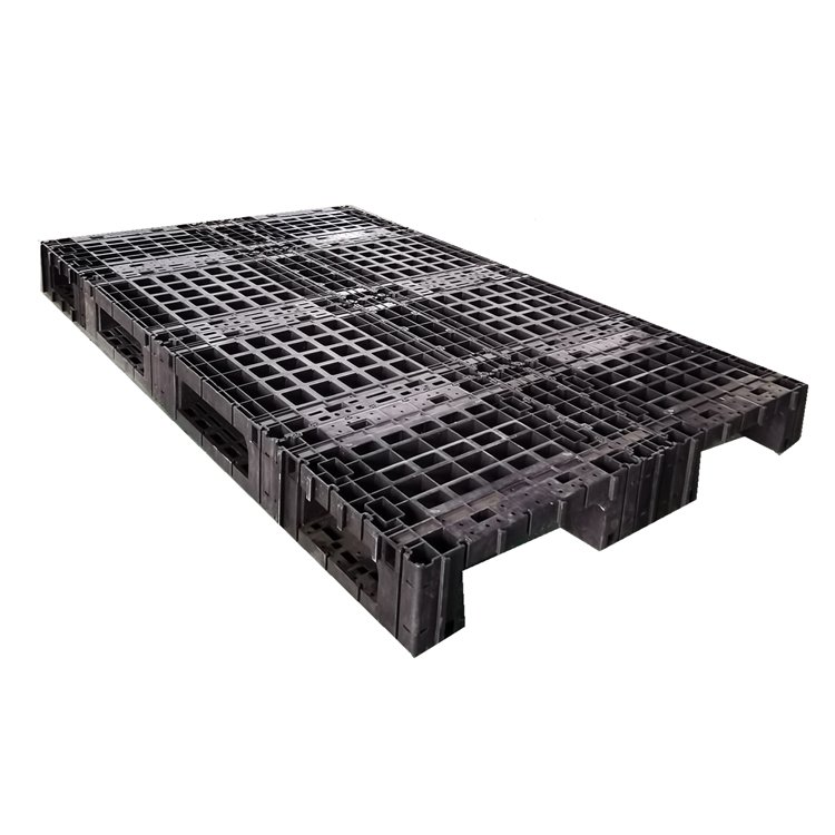 Three legged black plastic splicing pallet, showing grid surface and four-way fork