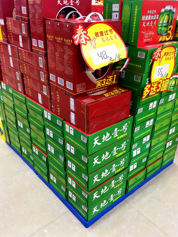 beverage cases stacked on blue plastic floor pallets for supermarket promotion