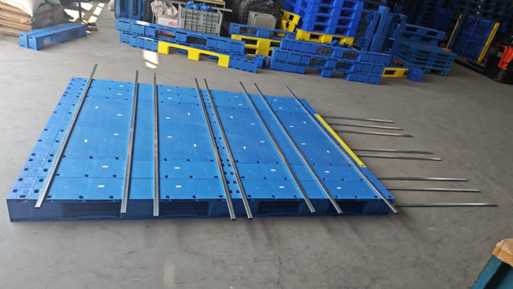 installation of steel pipes for modular plastic pallets