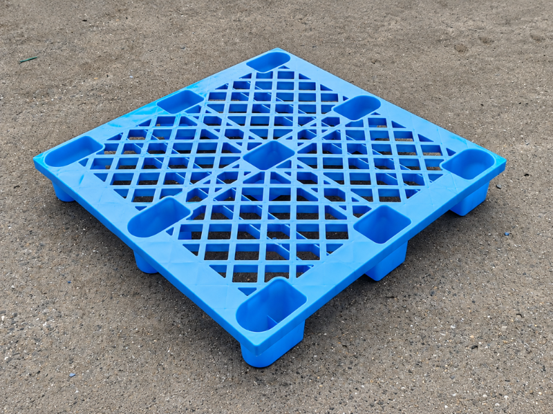 1200 × 1000 × 140 mm nestable plastic pallet on the ground