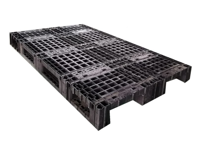Three legged black plastic splicing pallet, showing grid surface and four-way fork