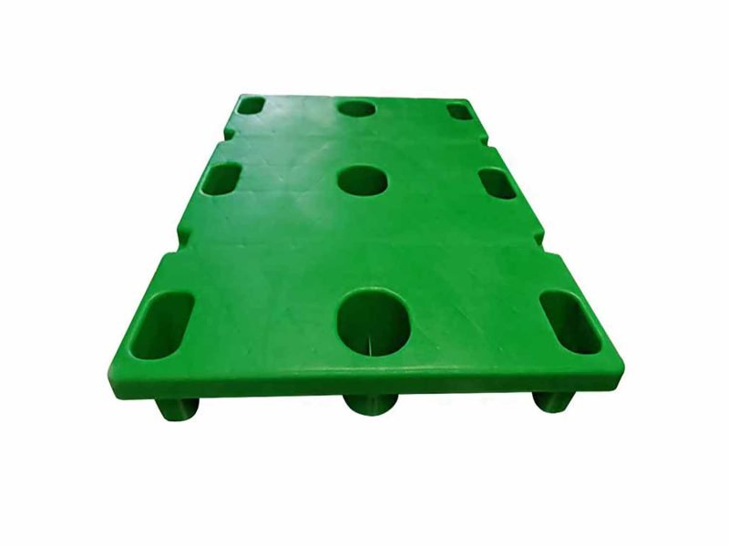 A green Printing Nestable 9 Legs Plastic Pallet, featuring multiple holes and a flat top, suitable for efficient storage and transport in the printing sector.