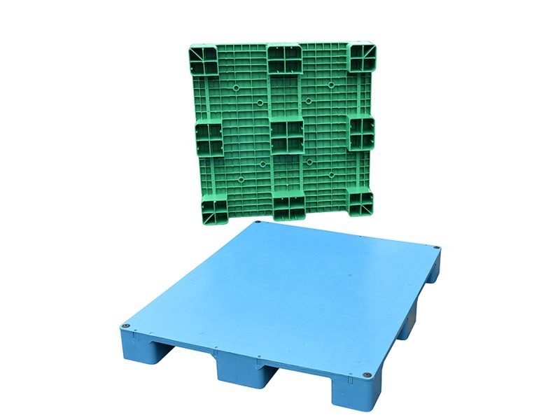 A green Solid HDPE 9 Feet Plastic Pallet and a blue one, both with solid HDPE construction and nine feet, providing sturdy support.