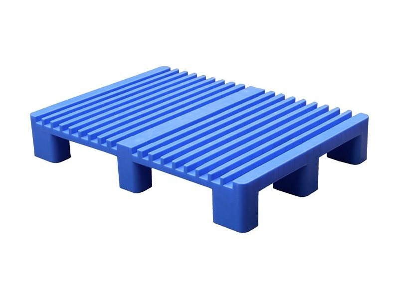 A blue ribbed deck plastic pallet, designed for the non - stop printing industry, offering durability and functionality for industrial use.