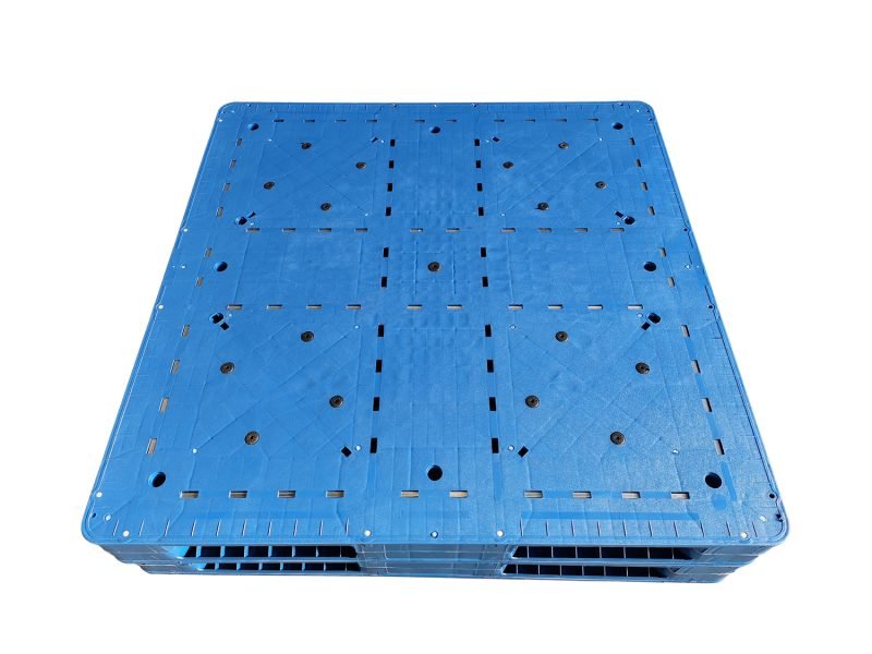 A blue reversible flat double - side rackable stackable plastic pallet. It features a flat surface with multiple holes and a sturdy structure, ideal for industrial use, allowing for both racking and stacking applications.
