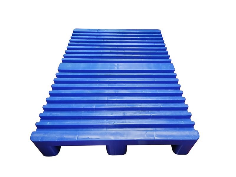 A blue Printing 3 Skids Plastic Pallet with ribbed surface, designed for printing industry use, providing sturdy support for materials.